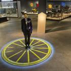 Toitū Otago Settlers Museum curator Peter Read stands in an animated projection at the entry of...