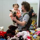 Dylan Cameron and Aria-Jayde Cameron (1) search the soft toys at the Oamaru Toyarama. PHOTO:...