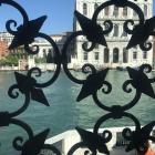 Looking at the Grand Canal through a decorative grill in the Palazzo Venier dei Leoni, which...