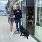 Wet Jacket Wines first mate/GM Ali Caird and owner Greg Hay and his dog, Dusky, by their new...