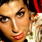 Amy Winehouse with trademark eye makeup.