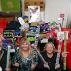 Preparing gifts from the annual Christmas Giving Tree charitable programme at Clutha Food Hub in...