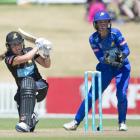 Wellington captain Melie Kerr smashes the ball through the onside during her game-high innings of...