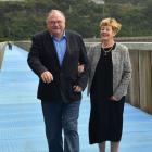 Dunedin surgeon Dick Bunton walks with wife Lynley, after he was awarded an ONZM for services to...