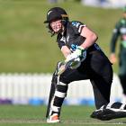 White Ferns batter Maddy Green plays the ball away during her innings of 83 against Pakistan at...