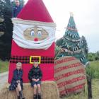 Cheviot Area School pupils Conrad,12, (top), Julia, 9 and Fletcher 10, with their festive work of...