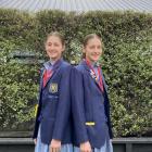 Eliza (left) and Zara McDonnell with their silver and gold medals from the New Zealand secondary...