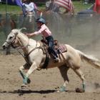 Briar Gillespie, of Oamaru, rides in the junior barrel race at the Omarama Rodeo yesterday....