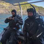 Wanaka divers Paul Sutherland (left) and Bill Day prepare to dive the "cavern of death" during...