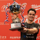 Paul Coll celebrates his win in Hong Kong. Photo via NZ Herald 