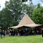 Wet weather forced many Oamaru partygoers to seek shelter under a tipi during their New Year's...