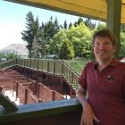 Puzzling world marketing and operations manager Duncan Spear stands above the Wānaka Maze, the...