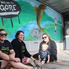 Marcia Brown, Cara Sharp, Ninette Miller and her son Declan, 4, were busy putting the finishing...