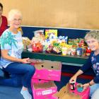 Preparing to help struggling families have a little bit extra at Christmas are (from left)...