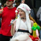  Ebony Spick, 11, of Waimate, enjoys a treat at the Waimate Strawberry Fare. PHOTO: WYATT RYDER