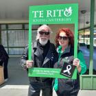 Event organiser Michelle Thew and husband Dave show their support for White Ribbon day and ending...