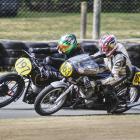 Phil Price (197) from Christchurch on his Velocette battles Brian Mitchell in race group 1. PHOTO...