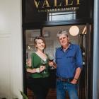 Nicole Schofield and Grant Taylor, from Valli Wines, celebrate the opening of their wine bar in...