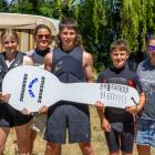 Celebrating a culinary victory over their campsite neighbours at Lake Aviemore are (from left)...