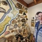 Museum owner Vince Burke, 85, with some of his precious agate rocks collected from all over New...