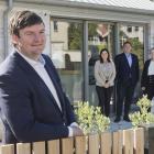 James Columb (front) and the team at Dunedin real estate agency Columbs and Co (from left) Amy...