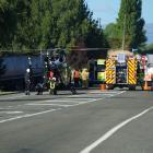 Emergency services at the crash scene on Monday. Photo: Wyatt Ryder