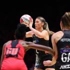 Silver Fern Maddy Gordon looks to pass in the match against Uganda in London. Photo: Getty Images 