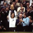 Franz Beckenbauer holds aloft the Fifa World Cup in 1974, after his West Germany team beat the...