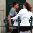 Joshua Chellew speaks with Zara Blackie’s mother outside the Oamaru District Court in 2019. PHOTO...