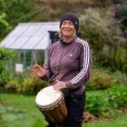Ra McRostie plays her Djembe drum at the Waitaki Community Gardens in ahead of her community...