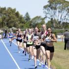 Becky Greene leads the pack on her way to winning the women's mile at the Lovelock Classic in...