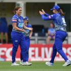 The Sparks’  Eden Carson is congratulated by Suzie Bates after taking a wicket. Photos: Gregor...