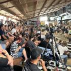 A crowd watches a five-stand shearing record in the Grant brothers’ woolshed in the Hokonui Hills...
