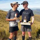 Darron Jones, left, and Fynn Mitchell celebrate finishing The Revenant ultra adventure race with...