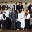 Thirty-one people gather to celebrate turning 20 years old, during a Japanese coming-of-age...