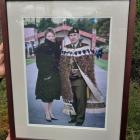 A framed photo of Peter Kelly and his wife, Kate, at the New Zealand Army national marae ...