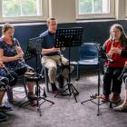 Practising clarinet together at the annual Waitaki Summer Music Camp are (from left) Jenny...