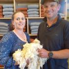 Esta and Tim Naylor hold their Romney lambs’ wool, which has been used to create the jerseys in...