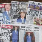 British newspapers reporting Britain's King Charles' cancer diagnosis are displayed, after the...