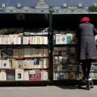 Booksellers argue they are a symbol of Paris like the Eiffel Tower, as well as a big tourist...
