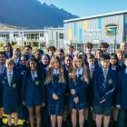 Wakatipu High School principal Oded Nathan, back left, pictured with representatives of 28 of the...