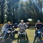Motorbike enthusiasts (from left) Arran Mason, Mel Peck and Tracy Mason, all of Dunedin, gather...