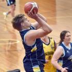 Otago rugby player Harry Taylor, representing team blue, goes for the hoop in the Sport Otago All...