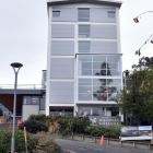 The extension of University of Otago residential hall Aquinas College has been hit by delays....