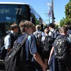 School pupils hustling to get a spot on the bus to Mosgiel in Green Island yesterday afternoon....