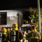 Firefighters at the scene in Christchurch last night. Photos: NZ Herald