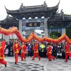 Crowds take in a performance celebrating Chinese New Year at the Lan Yuan Dunedin Chinese Garden...