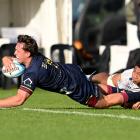 Hayden Michaels scores for  the Highlanders against Moana Pasifika in Queenstown. Photo: Getty...