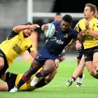 Highlanders winger Timoci Tavatavanawai charges forward during the his side’s Super Rugby Pacific...