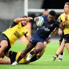 Highlanders player Timoci Tavatavanawai charges forward during the Super Rugby Pacific preseason...